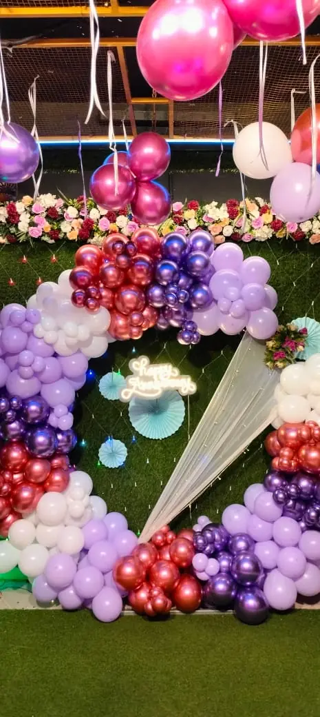 Lavender rose gold and white anniversary balloon backdrop at JD Party Box
